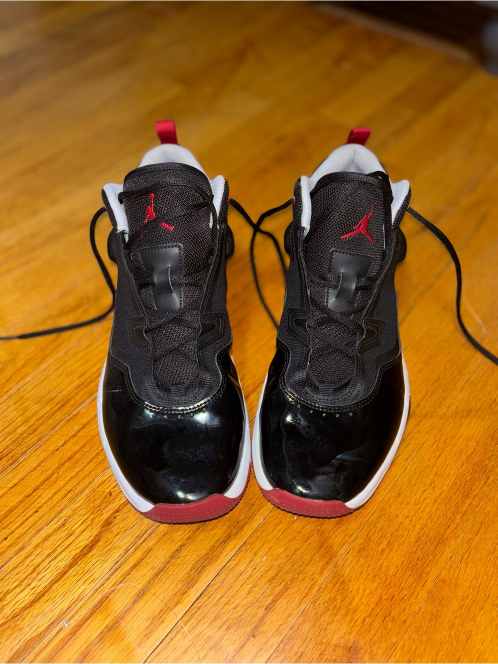 Men’s Jordan flights size 12  Black and Red Basketball-Inspired Sneakers